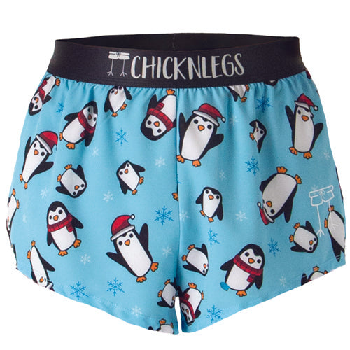 A ghost image of Chicknlegs Men's 2 inch split running shorts in the Slippery Bois Penguins design is shown.