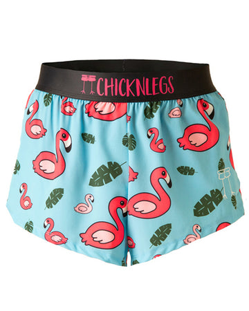 Chicknlegs men's 2 in split running shorts in the blue flamingo design as a ghost image. The print has a light blue background with green leaves and a hot pink flamingo.