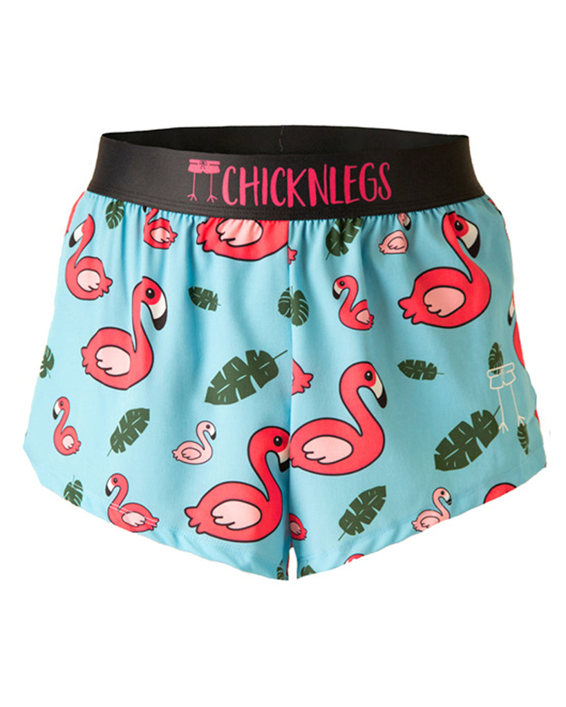 Chicknlegs men's 2 in split running shorts in the blue flamingo design as a ghost image. The print has a light blue background with green leaves and a hot pink flamingo.