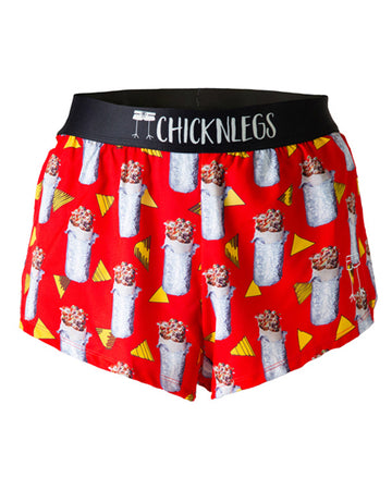 These chicknlegs men's 2 in split running shorts are in the burrito design, as a ghost image. These shorts are made for runners with the print having a red background with burritos on it and the with chips.