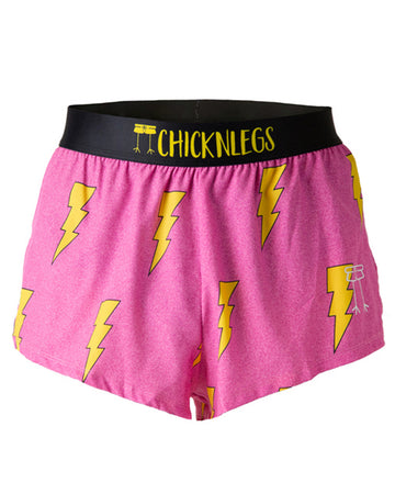 These shorts are from Chciknlegs as the men's 2 in split running shorts that have the hot pink bolts on them, as a ghost image. The print has yellow bolts on it with a hot neon pink background with a black waistband.