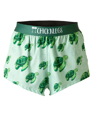 These shorts are from Chicknlegs in the men's 2 in split running shorts n the turtle design, as a ghost image. These shorts have sea turtles all over them with bubbles on a light green background. Lot of green.