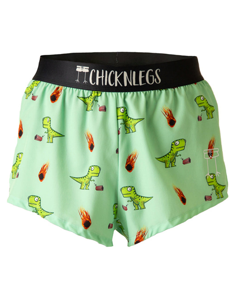 The chicknlegs shorts are men's 2 in split running shorts in the dino-sore print, as a ghost image. The print has green dinosaurs on it with popcorn on a light green background. These shorts are made for runners.