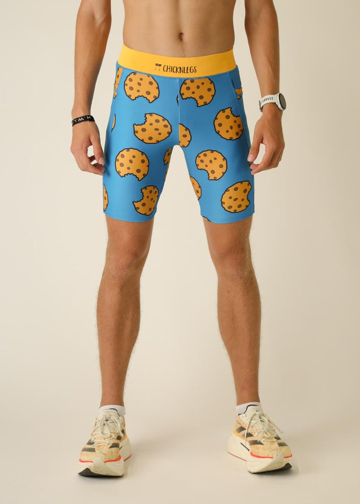 Model wearing Chicknlegs men's 8 inch half tights in the cookies design, front view.