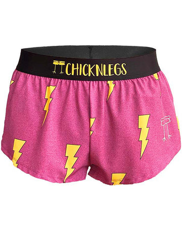 Chicknlegs women's 1.5 in split running shorts in the hot pink bolts design, as a ghost image. The print has fun yellow bolts on it with a bright neon pink background. Fun for runners who want to be fast as a lightning. 