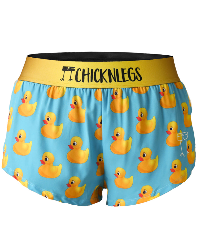 Chicknlegs women's 1.5 in split running shorts in the rubber ducky design as a ghost image. The print has rubber duckys on it that are yellow on a blue background.