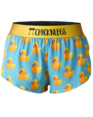 Ghost image is from ChicknLegs in the women's 1.5 in split running shorts in the rubber ducky design. The print has rubber ducks on it that are yellow on a blue background.