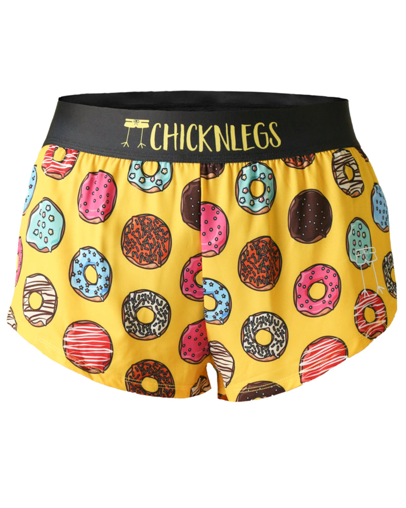 Chicknlegs women's 1.5 in split running shorts in the salty donuts design as a ghost image. The print has various doughnuts all over it in many flavors. Runners love donuts.