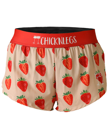 Chicknlegs women's 1.5 in split running shorts in the strawberry szn design, as a ghost image. The print has fun strawberries all over it.