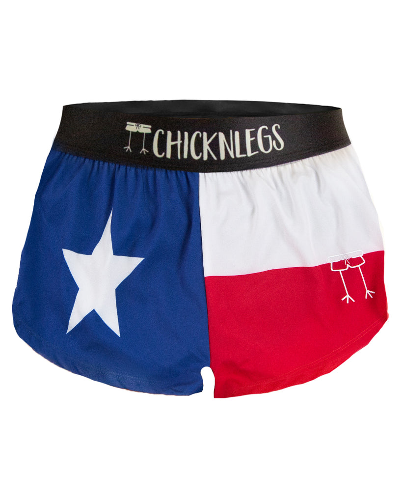 Ghost image of ChicknLegs women's 1.5 in split running shorts are shown in the Texas Flag print.