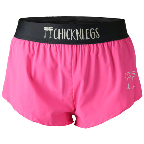 Closeup product shot of the women's neon pink 1.5 inch split running shorts from ChicknLegs.