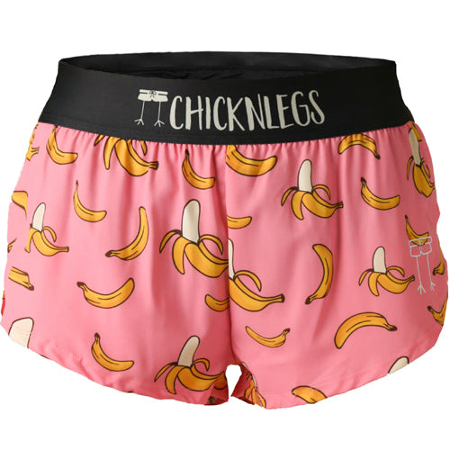 Closeup product shot of the women's pink bananas 1.5 inch split running shorts from ChicknLegs.