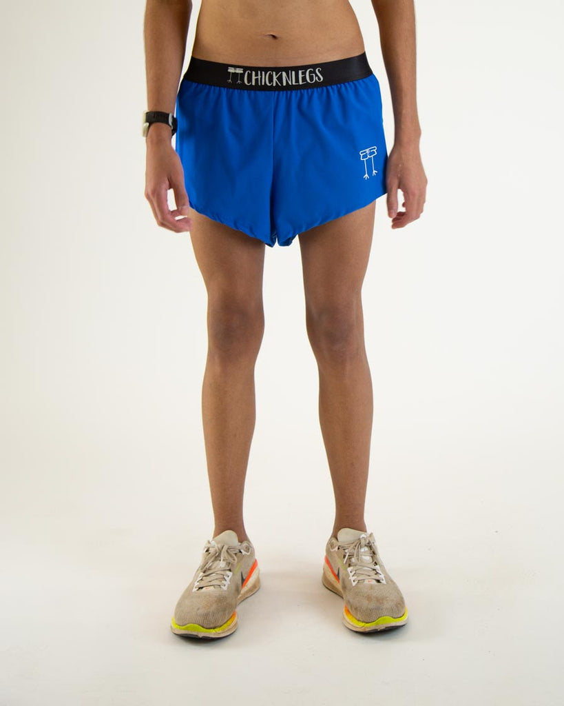 Runner is wearing ChicknLegs in the men's 2 in split running shorts in the royal blue design.