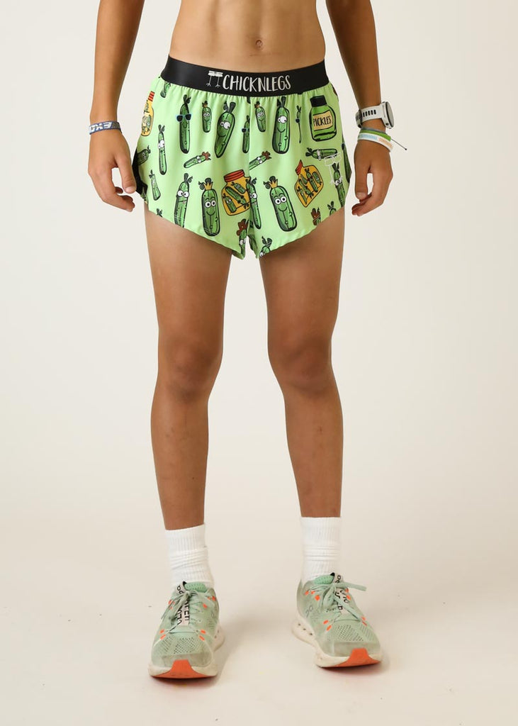 Model wearing Chicknlegs mens 2 inch split running shorts in pickles design front view