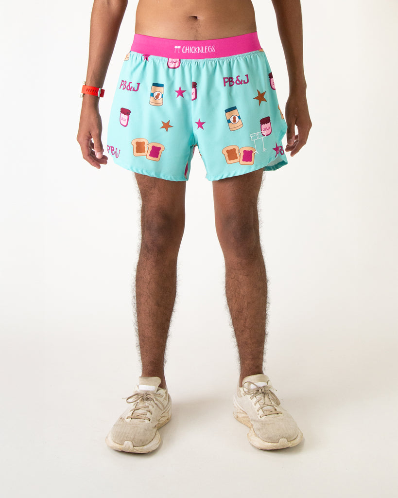 Runner is wearing ChicknLegs in the men's 4 in split running shorts with a back pocket and inner liner pocket. The print is PB&j with peanut butter, jelly, toast, and stars.