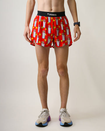 Runner is wearing ChicknLegs in the men's 4 in split running shorts in the burritos design. The print has burritos in foil with chips all over it on a red background. Great for runners who love chipotle and love food.