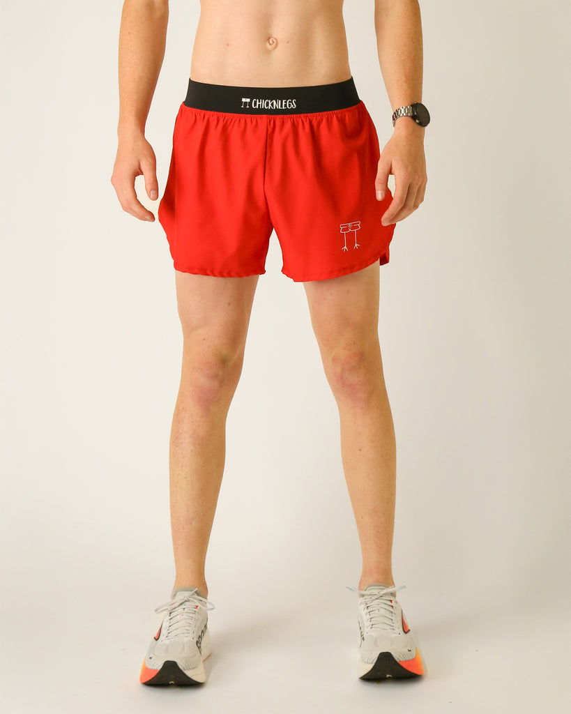 Runner is wearing ChicknLegs in the men's 4 in split running shorts that has a back pocket and inner liner pocket. The print is a solid red color. Great for valentines day and any holiday for christmas as santa.