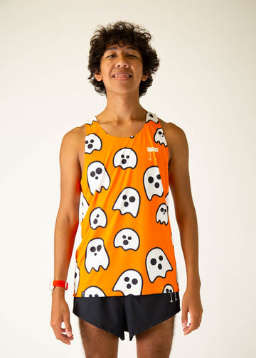 Model is a runner, wearing Chicknlegs in the men's running singlet in the ghost design, facing front.