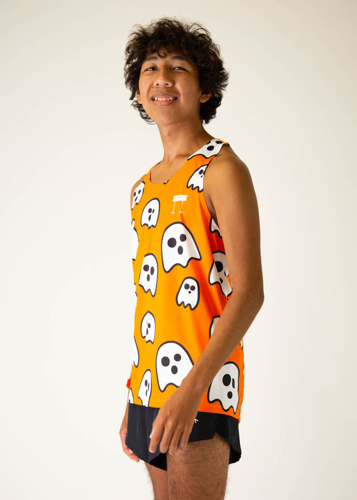 Model is a runner, wearing Chicknlegs in the men's running singlet in the ghost design, facing left.