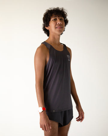 Runner is wearing ChicknLegs in the men's performance singlet in the solid black design.