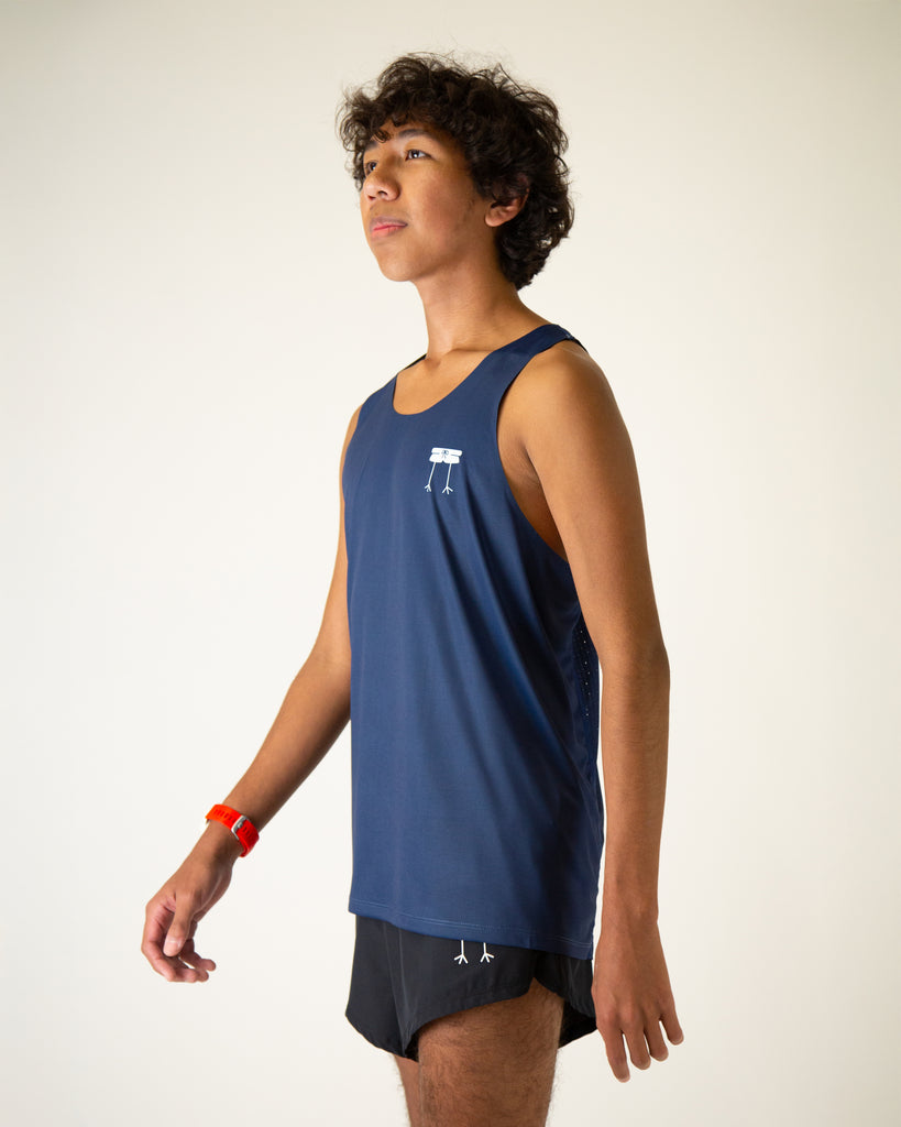 Runner is wearing ChicknLegs in the men's performance singlet in the solid navy color.