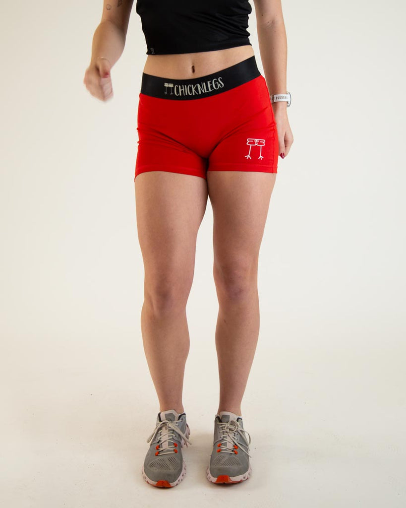 Runner is wearing ChicknLegs in the women's 3 in compression spandex shorts in the solid red design. Great for valentine's day or christmas.