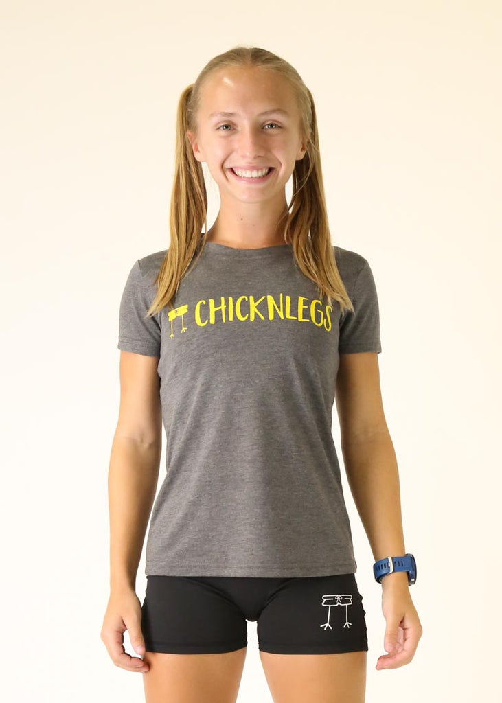 Model wearing Chicknleg's heather grey tee, facing front.