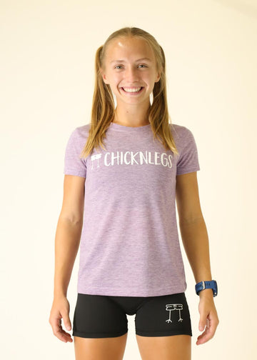 Model wearing Chicknleg's heather purple tee, facing front.