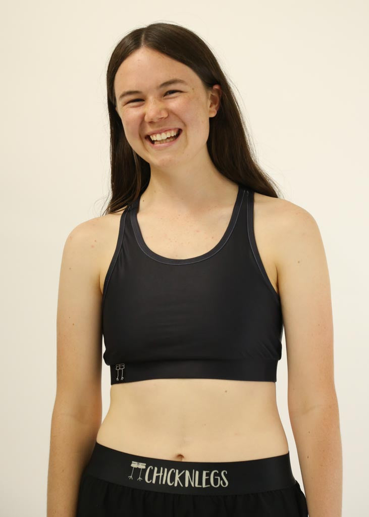 Front view of the black OG running sports bra from ChicknLegs.