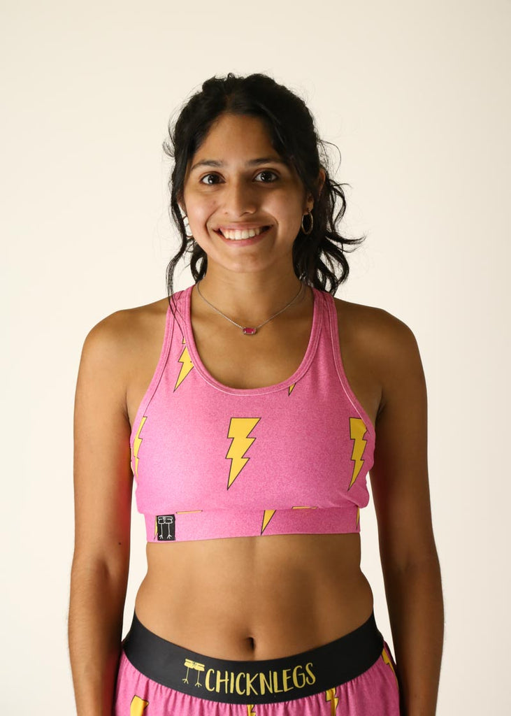Front view of the pink bolts OG running sports bra from ChicknLegs.