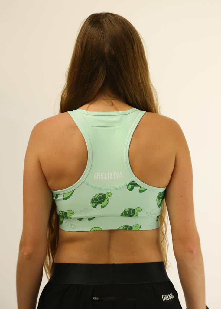 Back view of the sea turtle OG pocket sports bra from ChicknLegs.
